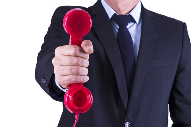 businessman with red phone - Foto, Imagen