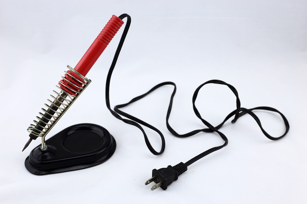 Free soldering iron handle red cycle repair it. - Photo, Image