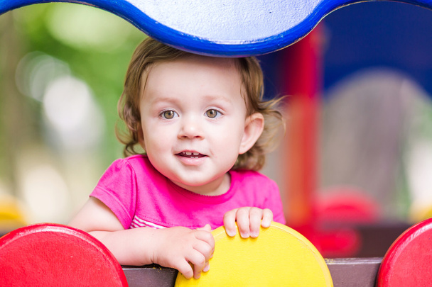 Beautiful baby girl playign outdoor - Fotografie, Obrázek