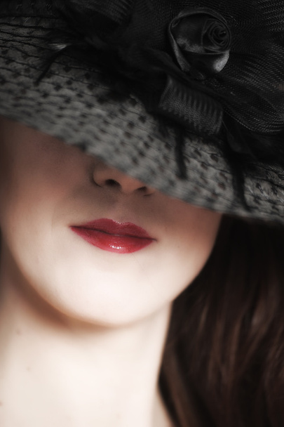 The woman in a wide-brimmed hat - Fotografie, Obrázek
