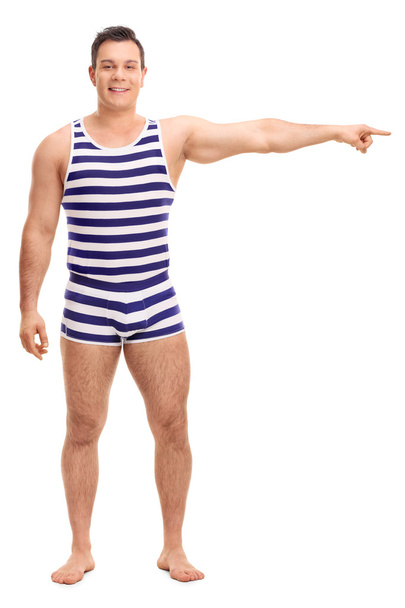 Man in a striped underwear pointing right  - Foto, imagen