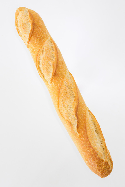 baguette on a light background with a place for inscription - Photo, Image