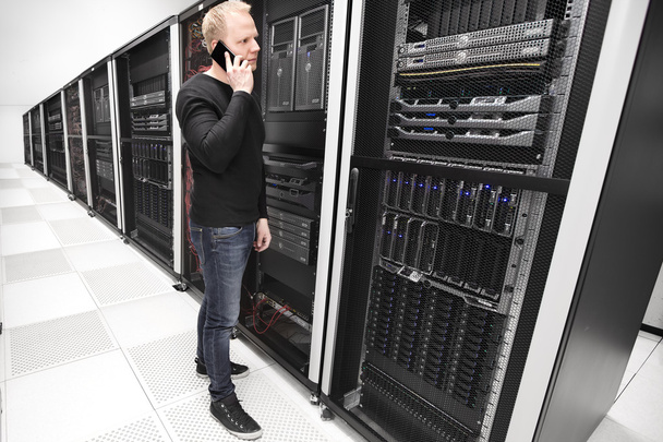 It consultant works in large enterprise datacenter - Photo, Image