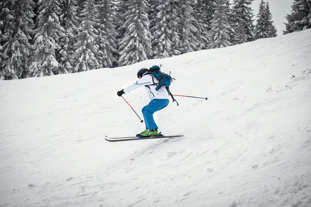 Man skiing on slope - winter holidays - Photo, Image
