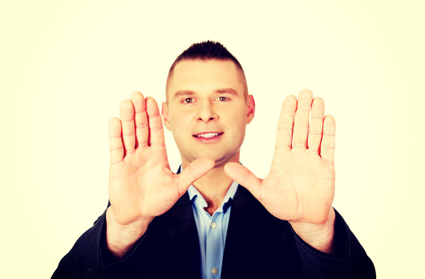 Businessman gesture stop sign with his hands - Photo, image