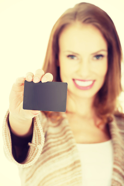 Happy woman with blank card. - Photo, image