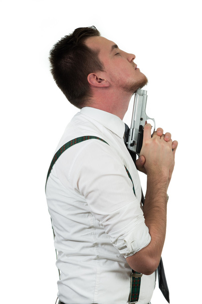 бизнесмен с пистолетом хочет покончить с собой
 - Фото, изображение