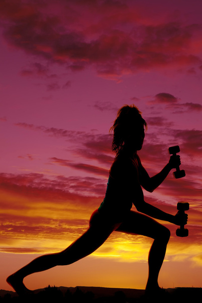 silhouette of woman with weights - Photo, Image