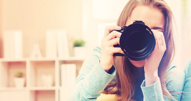Young female photographer - Foto, Imagen