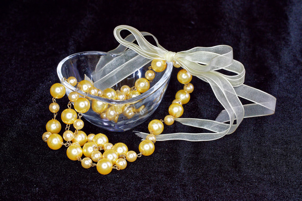 golden pearls in love shape glass - Photo, Image