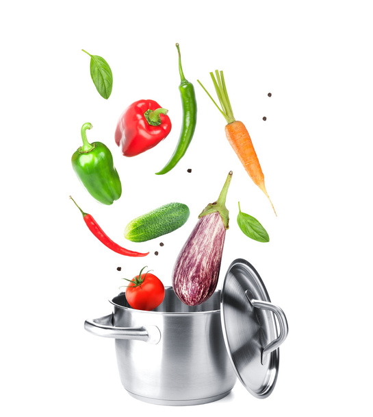 Приготування їжі з овочами в каструлі
 - Фото, зображення