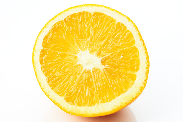 Half of orange isolated on white - Φωτογραφία, εικόνα