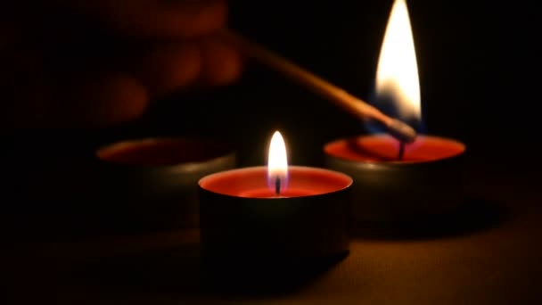drie verlichte kaarsen - Video