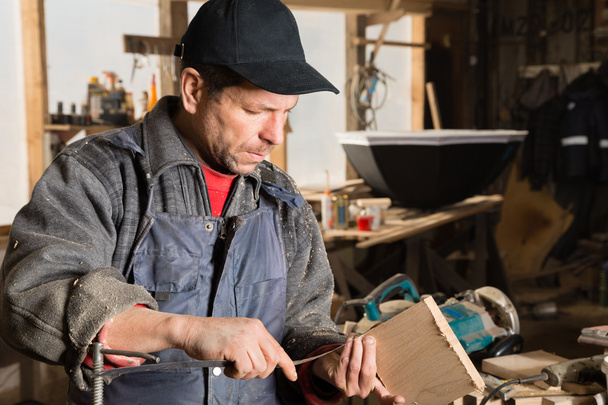 Carpenter produces parts for furniture  - Valokuva, kuva