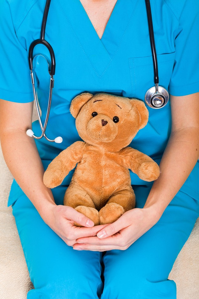 Arzt mit Teddybär - Foto, Bild