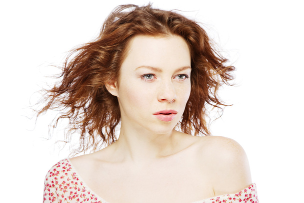 Beautiful red-haired model on white background - Valokuva, kuva