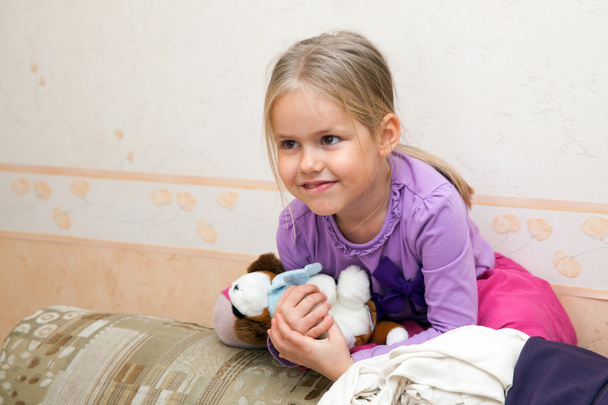 Little girl playing with toy - Zdjęcie, obraz