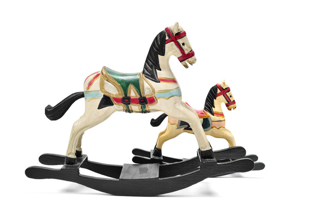Beyaz bir arka plan üzerinde eski oyuncak atlar - Fotoğraf, Görsel
