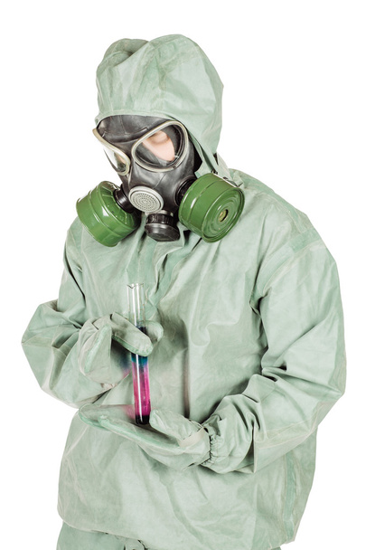 Man with protective mask and protective clothes examines a water sample - Foto, Imagen