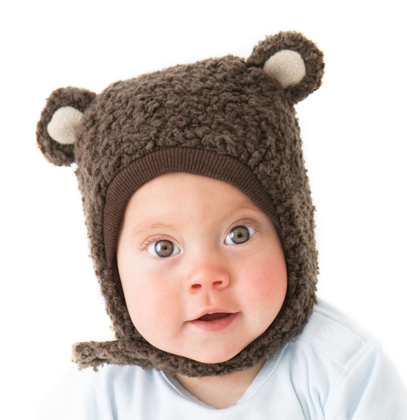 Little boy in a cap with ear flaps - 写真・画像