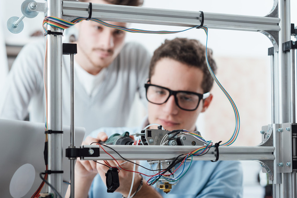 Young engineers 3D printing - Photo, image