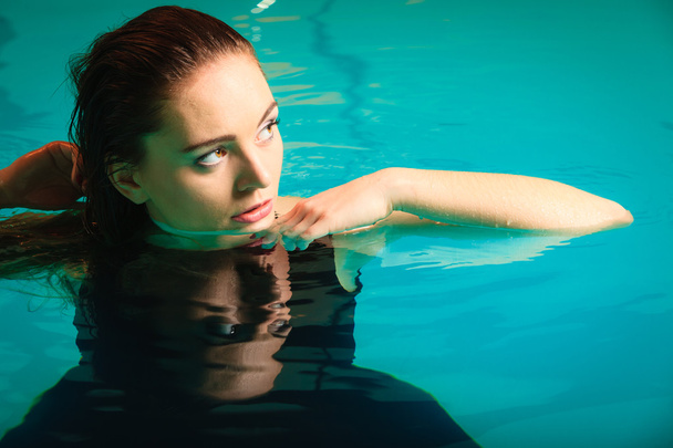 Portrait of sexy seductive woman in water. - Foto, Imagen