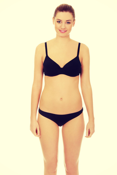 Beautiful woman standing in bikini. - Foto, Imagem