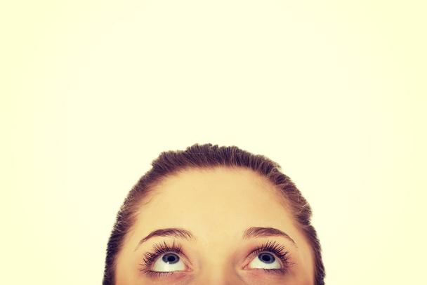 Young womans eyes looking up. - Photo, image