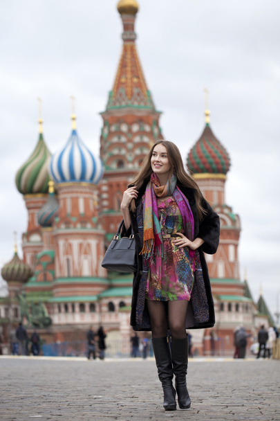 Young woman in a mink coat on the Red Square in Moscow - Photo, image