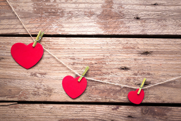 Valentine's hearts on rustic wooden background - 写真・画像