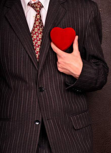 Empresário com coração de Valentim
 - Foto, Imagem