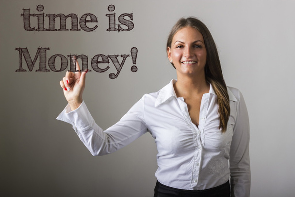 Time is money! - Beautiful girl touching text on transparent sur - Photo, Image