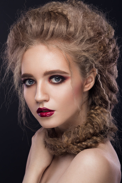 Beautiful girl with bright make-up, perfect skin and hairstyle as a braid. - Valokuva, kuva