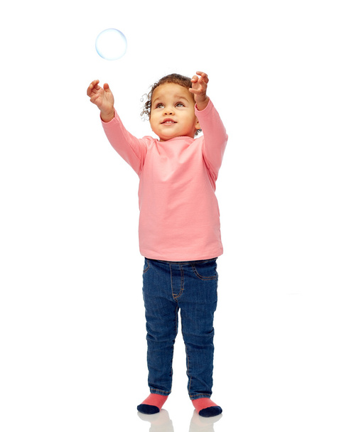 little baby girl playing with soap bubble - Photo, Image