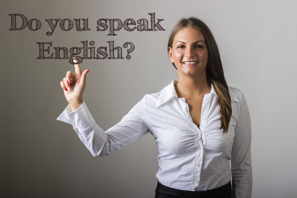 Do you speak English? - Beautiful girl touching text on transpar - Photo, image