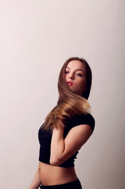 Long hair. Hairstyle. Hair Salon. Fashion model with shiny hair. - Foto, afbeelding