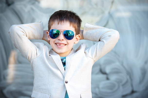 Little boy in a nice suit and glasses. Back to school. Children portrait - Fotó, kép