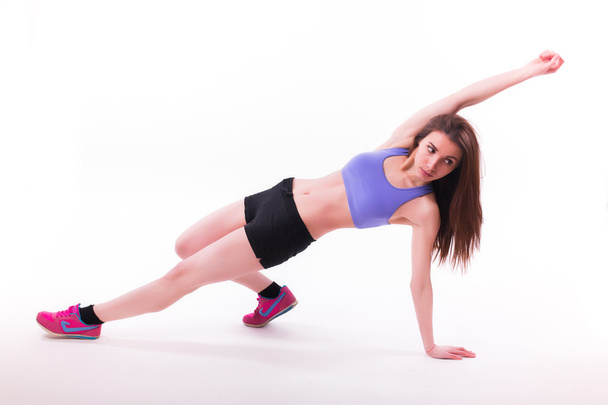 mladá žena dělá fitness cvičení - Fotografie, Obrázek