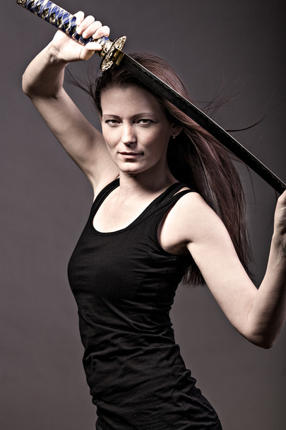 жінка з меч
 - Фото, зображення