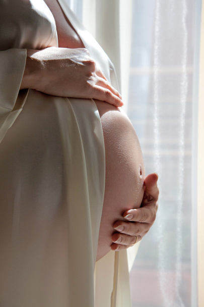 Nő terhes has - Fotó, kép