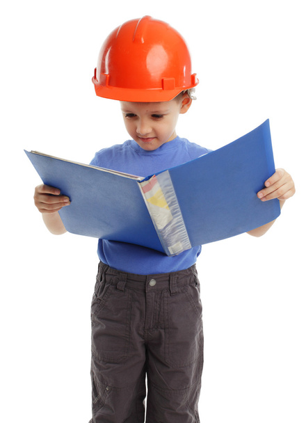 Child in a building helmet - Foto, immagini