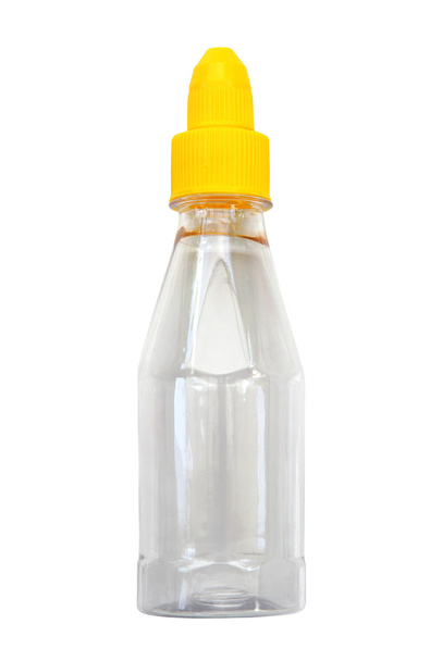 Molho vazio garrafa de vidro Pop-up Cap isolado, caminho de recorte
 - Foto, Imagem