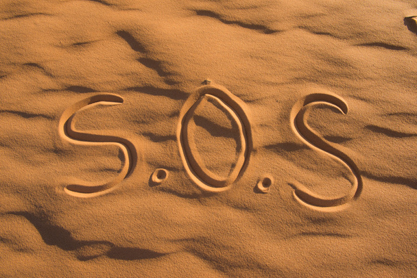 S.O.S Signe sur la plage
 - Photo, image