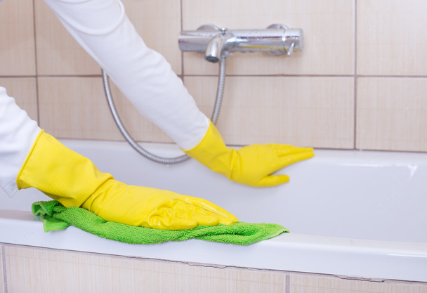 Woman cleaning bathtub - Photo, Image