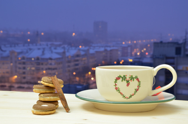 'S avonds thee en koekjes - Foto, afbeelding