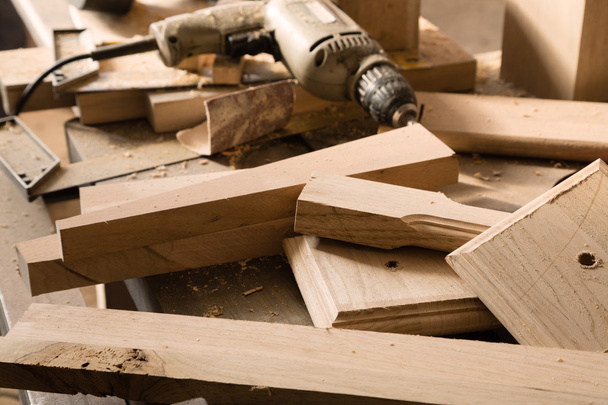 Billets of wood for furniture lie on a workbench  - Foto, Imagen