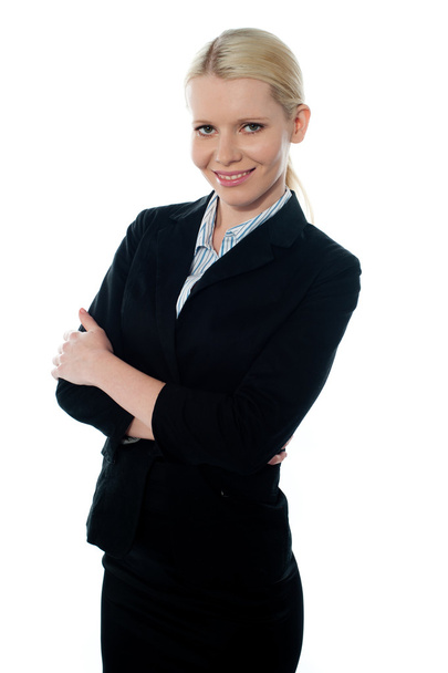 Smiling young femlae CEO posing with folded arms - Valokuva, kuva