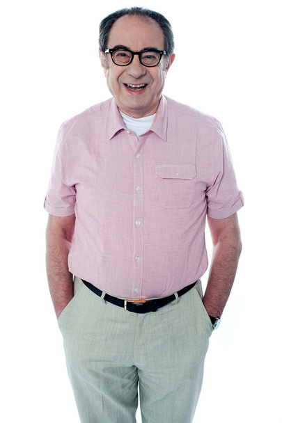 Smiling casual senior man with hands in pocket - Foto, Imagem