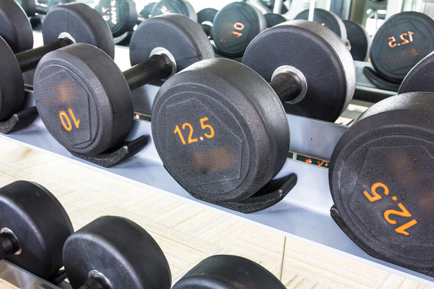 Rows of dumbbell - Photo, Image