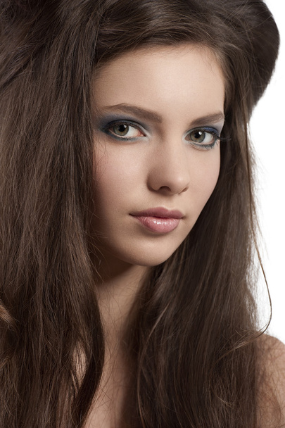 Brunette with blue eye makeup - Foto, afbeelding